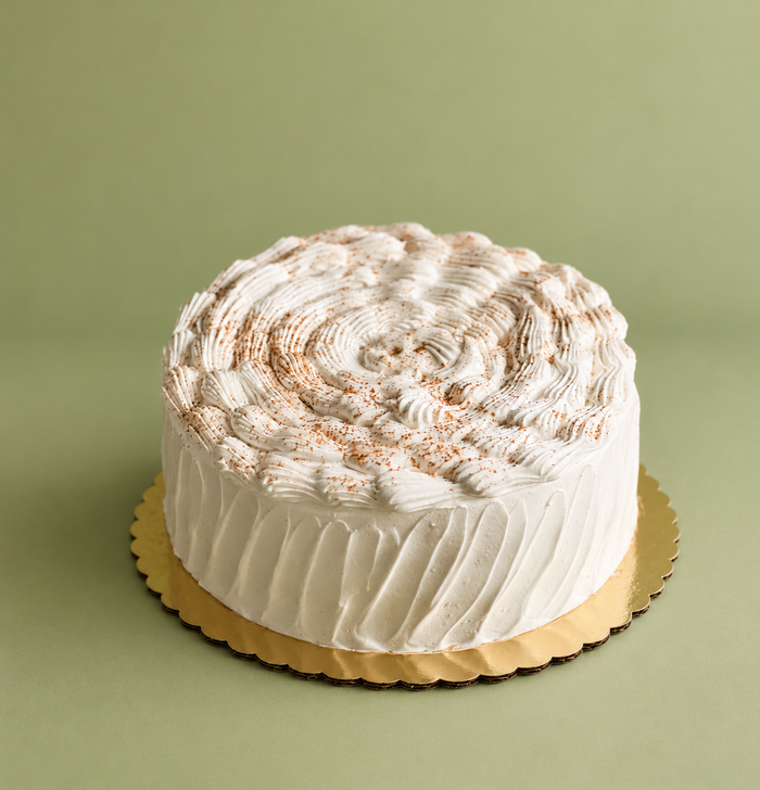 Snickerdoodle travel-size Dominican cake with cinnamon cream, dulce de leche and suspiro by Casa Gioia Miami
